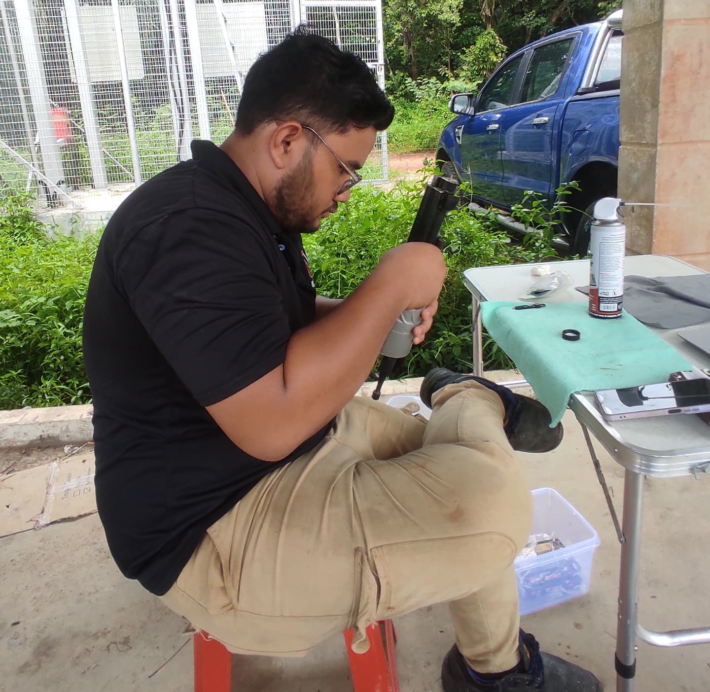 Technician calibrating equipment